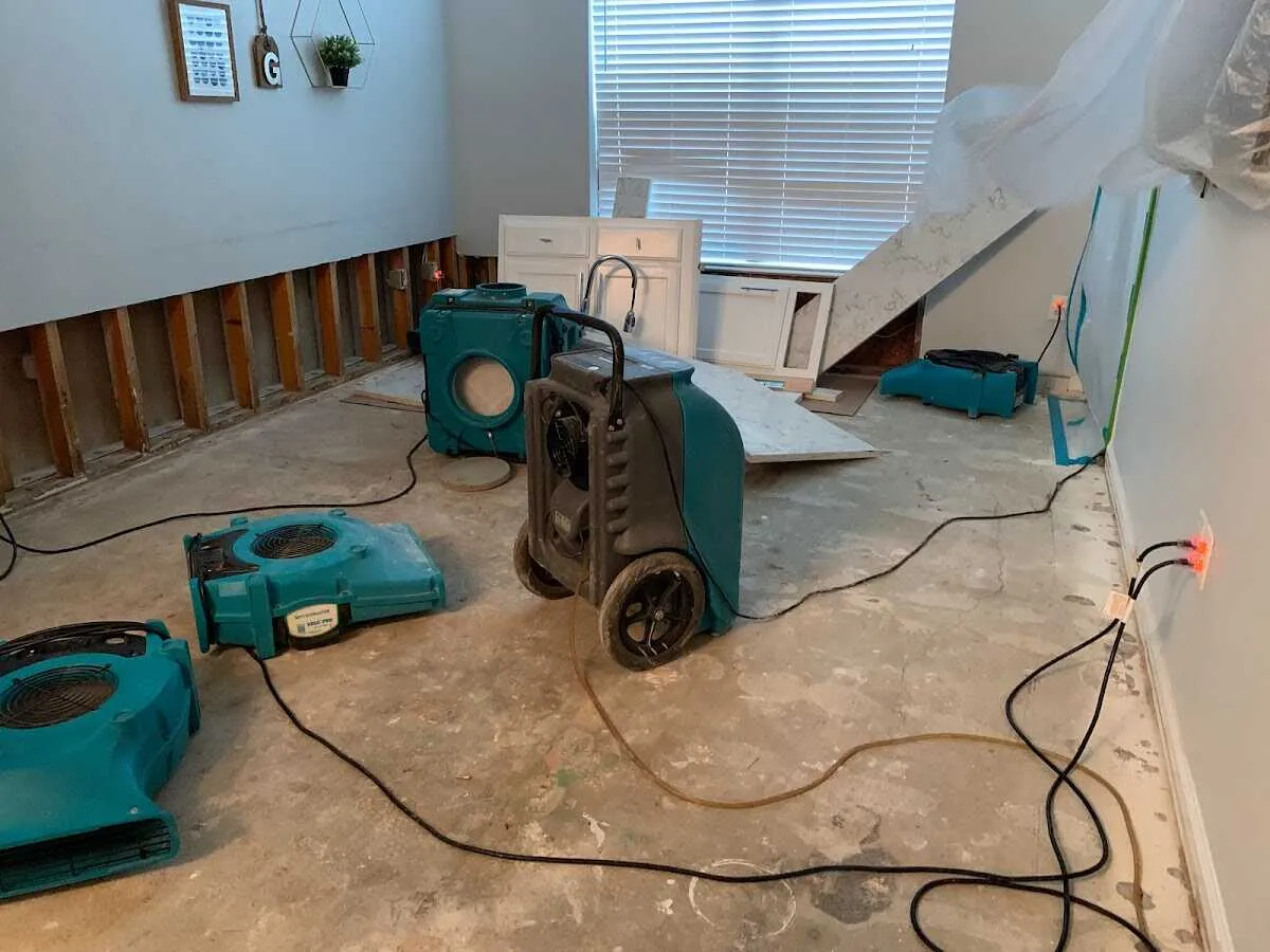 Dehumidifier in flood-cut room for Water Damage Restoration in Peoria Heights